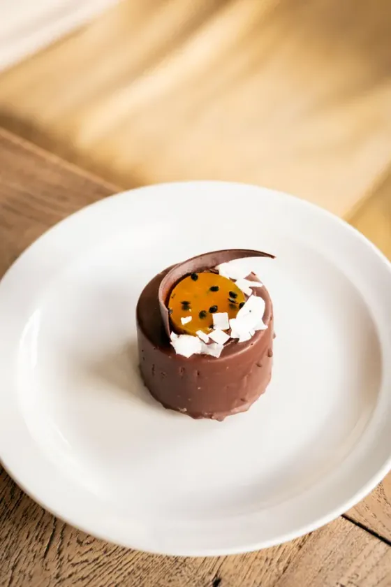 Chocolate mousse cake with passionfruit and coconut, from the cabinet