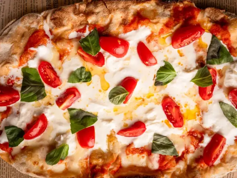 Roman-style pizza with burrata, cherry tomatoes and basil