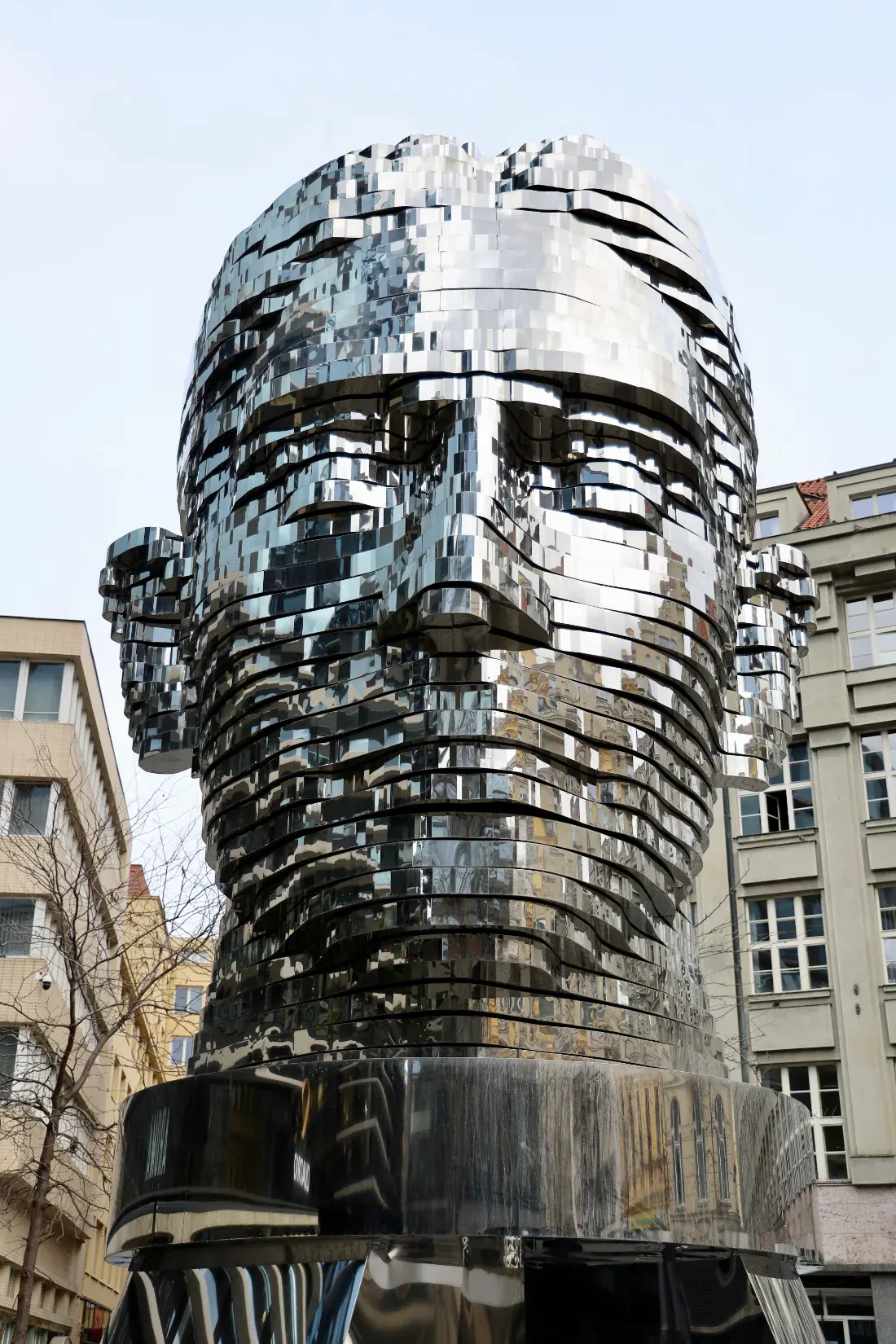 Franz Kafka's rotating mirrored-steel head sculpture in Prague